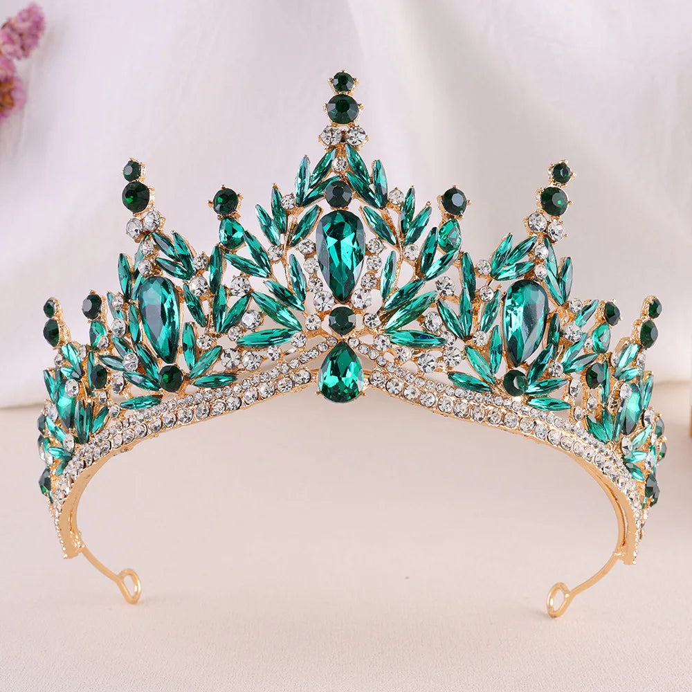 Green crystal tiara headband with teal stones, leaf crown design, and rhinestone trim