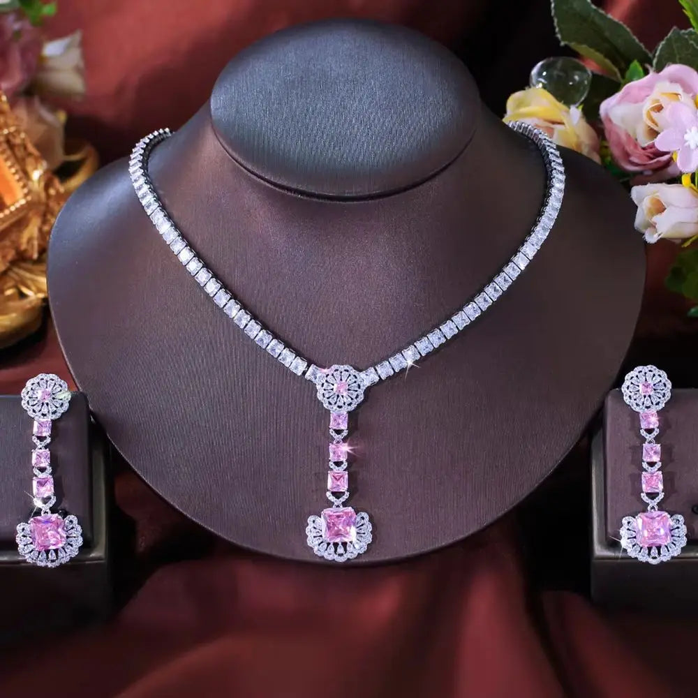 Silver-tone necklace with pink zirconia teardrop pendant and matching drop earrings set