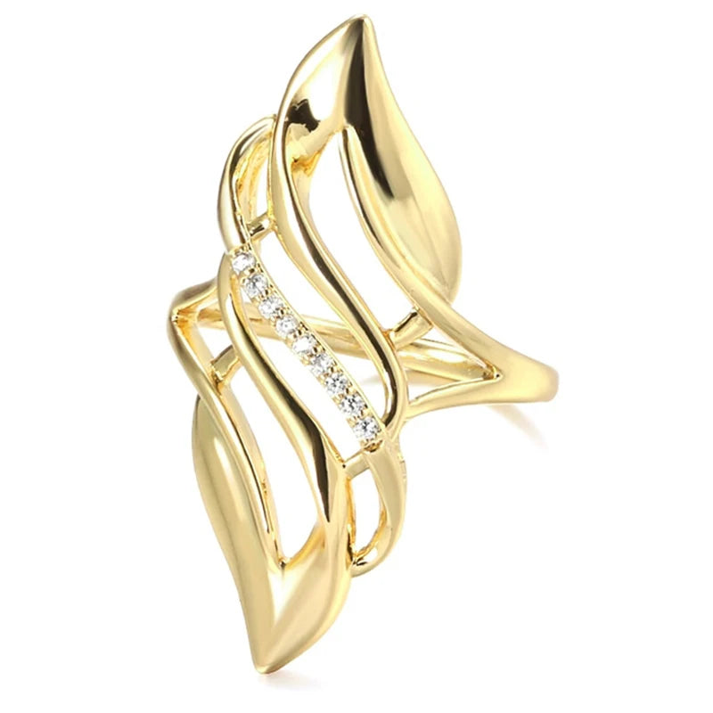 Gold-tone hollow geometric statement ring with oval openwork and sparkling crystal band