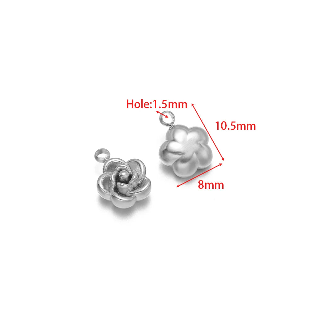 Silver-tone rose flower charm pendant with top loop, close-up detail