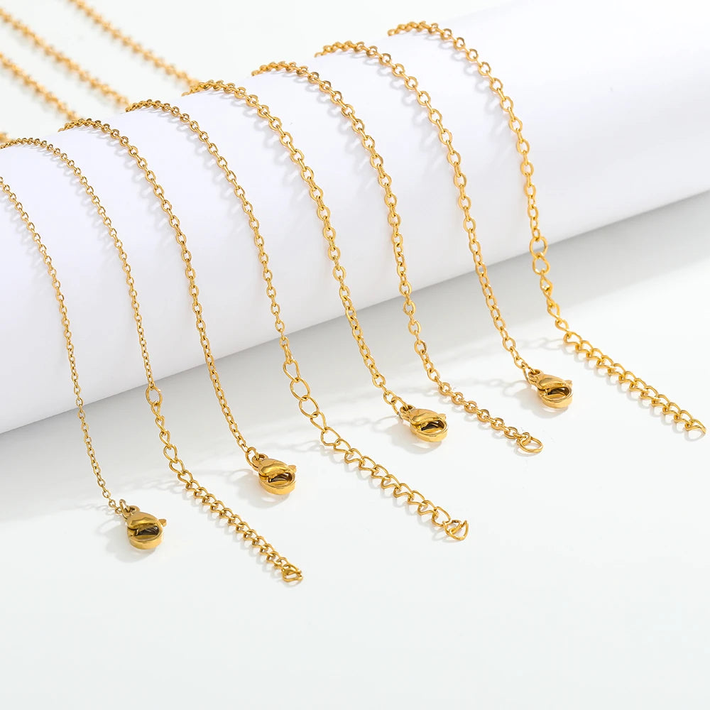 Gold and steel cable link chain extenders with small clasp connector ends