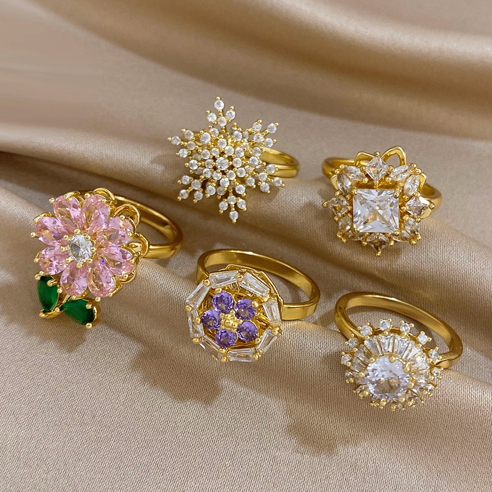 Gold-plated copper flower zirconia ring set with clear, pink, and purple stones