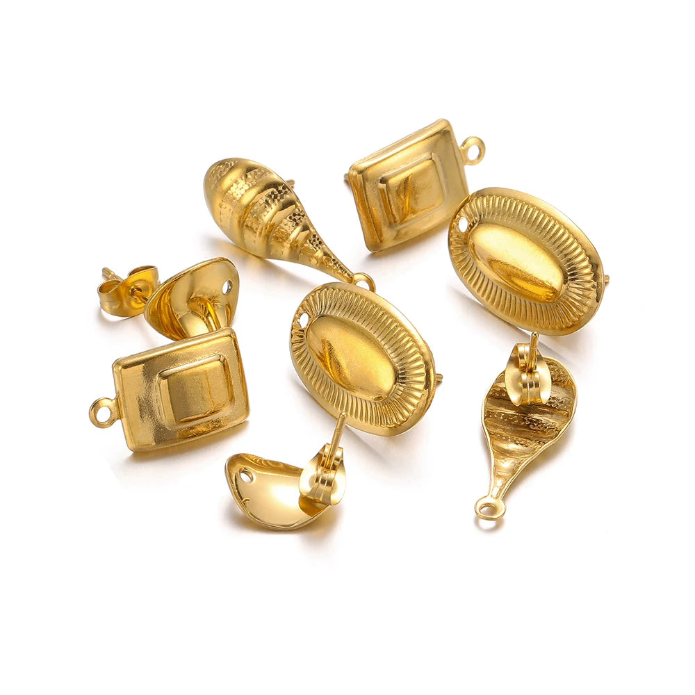 Gold oval stud earring findings set with back posts and connector loops for DIY jewelry