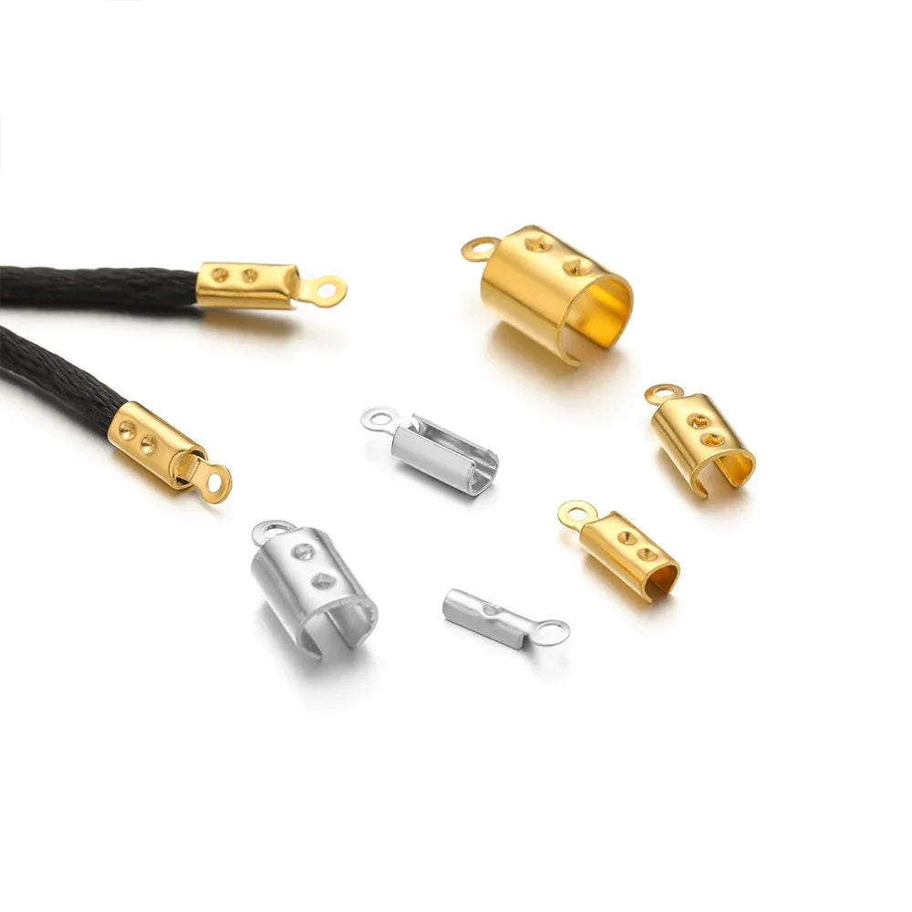 Crimp end bead caps on black cord, gold and silver metal tubes with side loop, crimp holes.