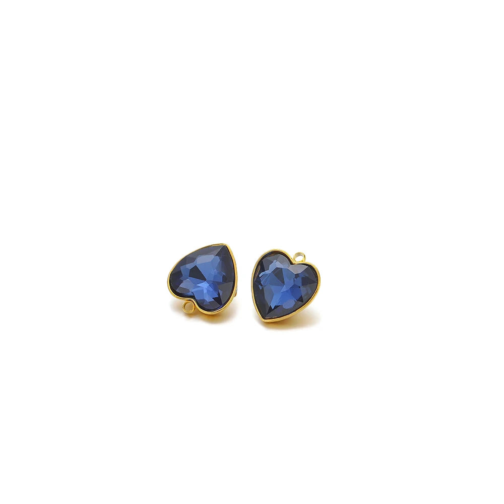 Heart-shaped crystal pendant charm, dark blue stone with gold-tone loop bail
