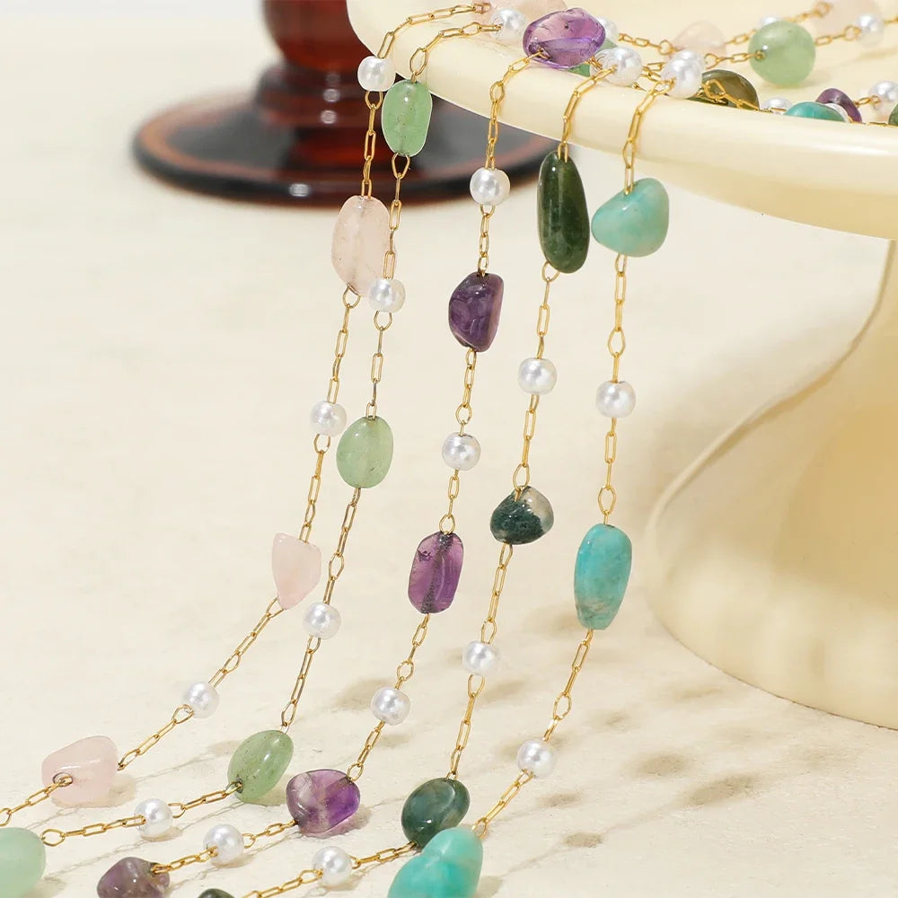 Irregular stone bead chain drops on gold-toned links with pearl and mixed-color stones