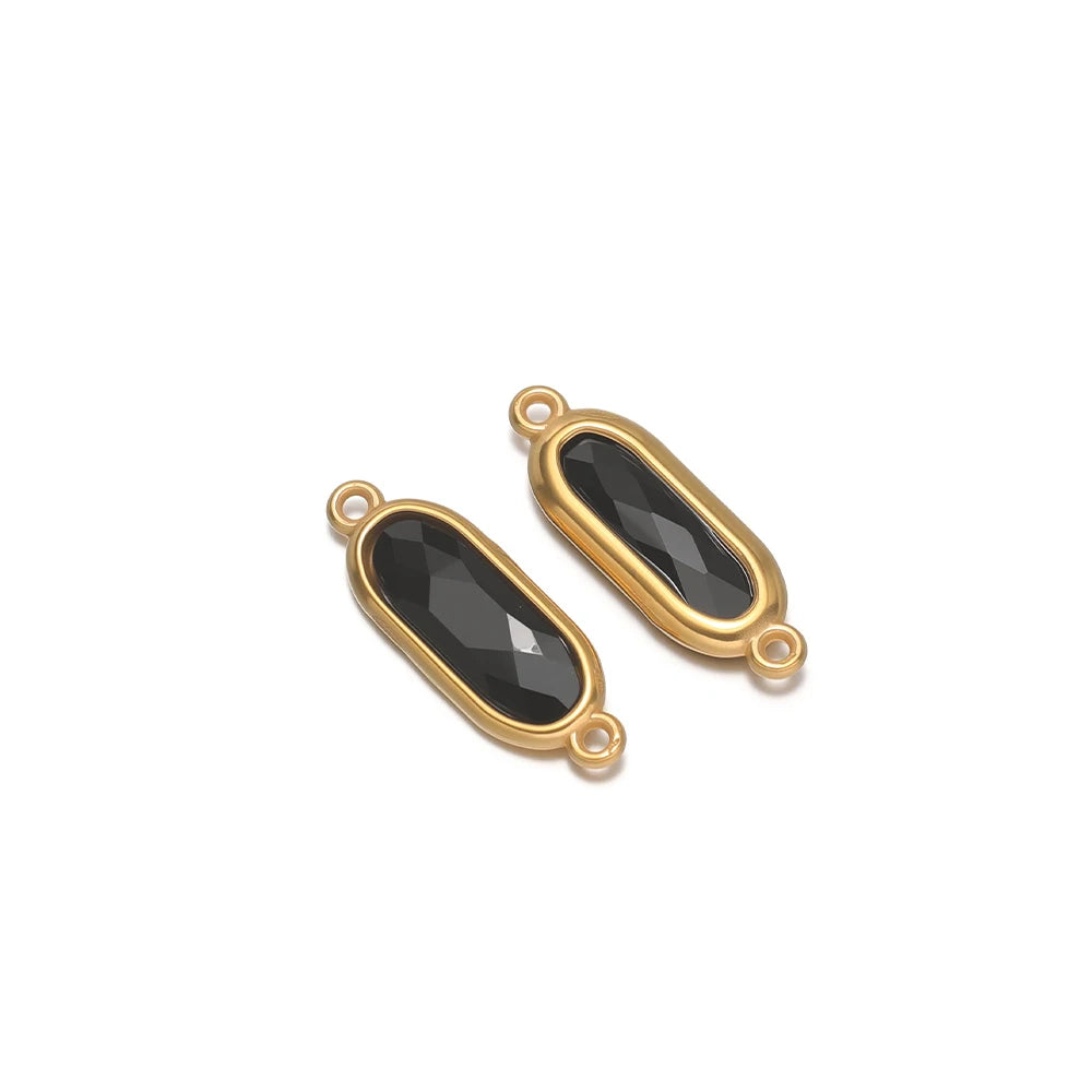 Oval glass charm connectors, dark gray faceted glass in gold bezels, with loops
