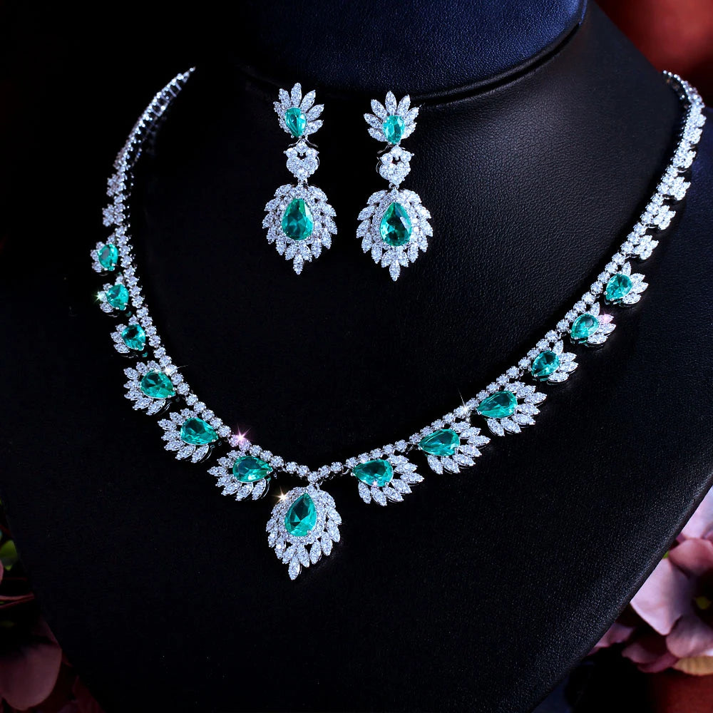 Teal teardrop stone necklace with leaf border and matching drop earrings