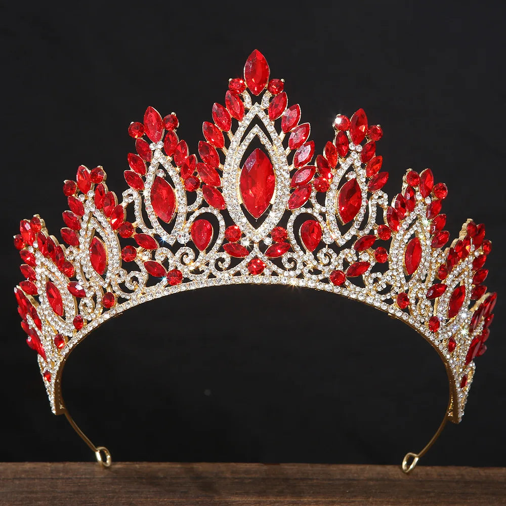 Red rhinestone tiara headband with oval center stones and gold-tone decorative base