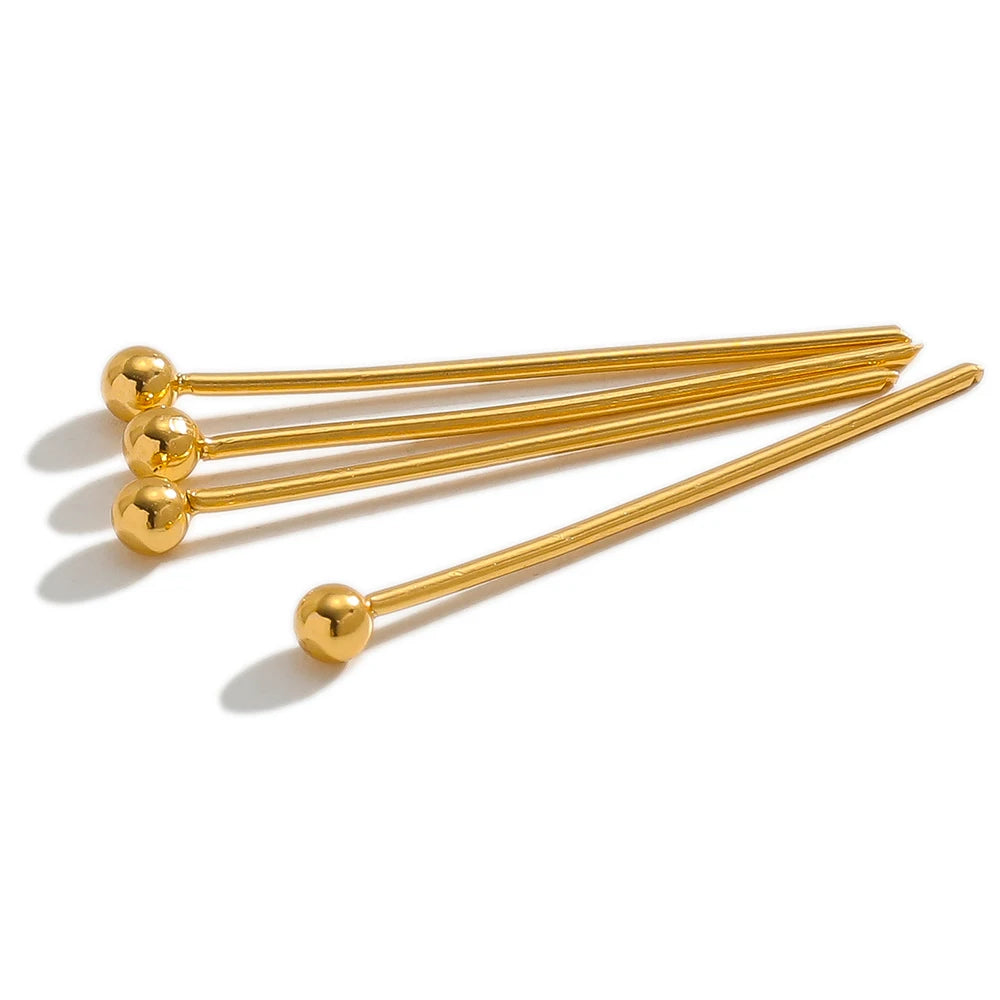 Gold ball head pins set with round gold ball tips and multiple straight stems