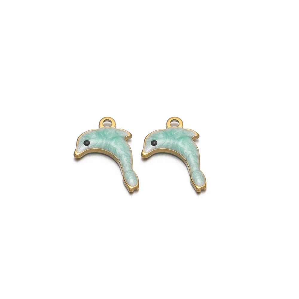 Pair of light teal enamel dolphin charms with gold-tone loop and black eye details