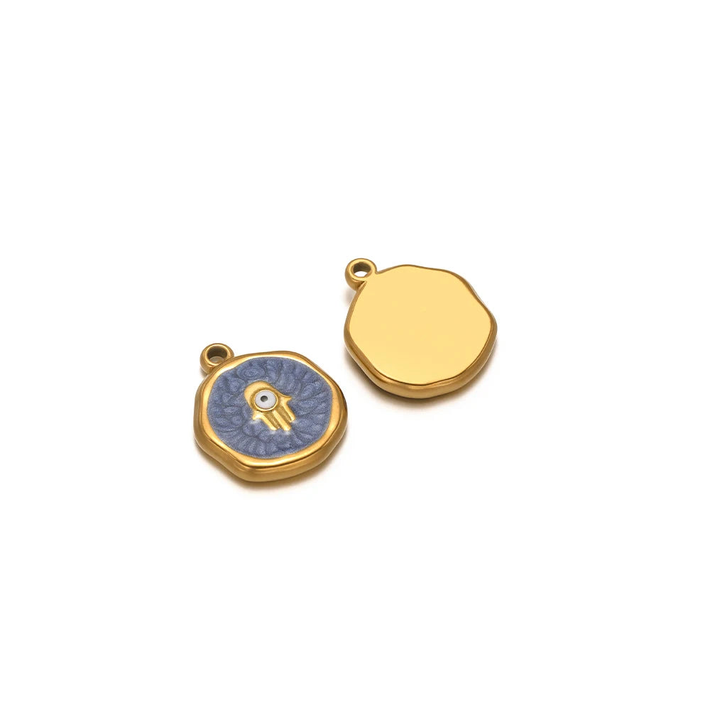 Enamel evil eye charm pendant with blue eye and gold outline on round bezel