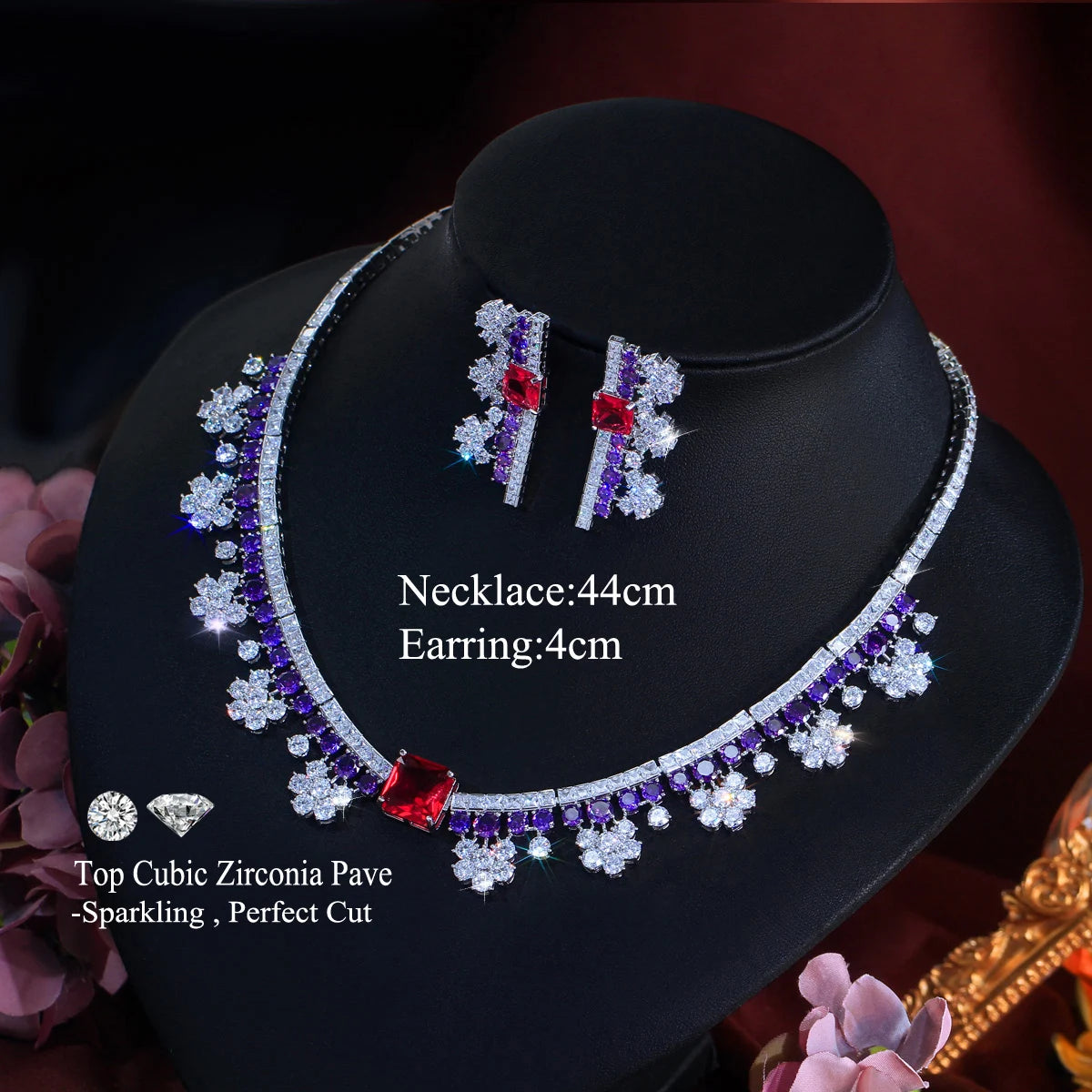Multicolor crystal choker necklace with purple stones and red square centerpiece; matching earrings