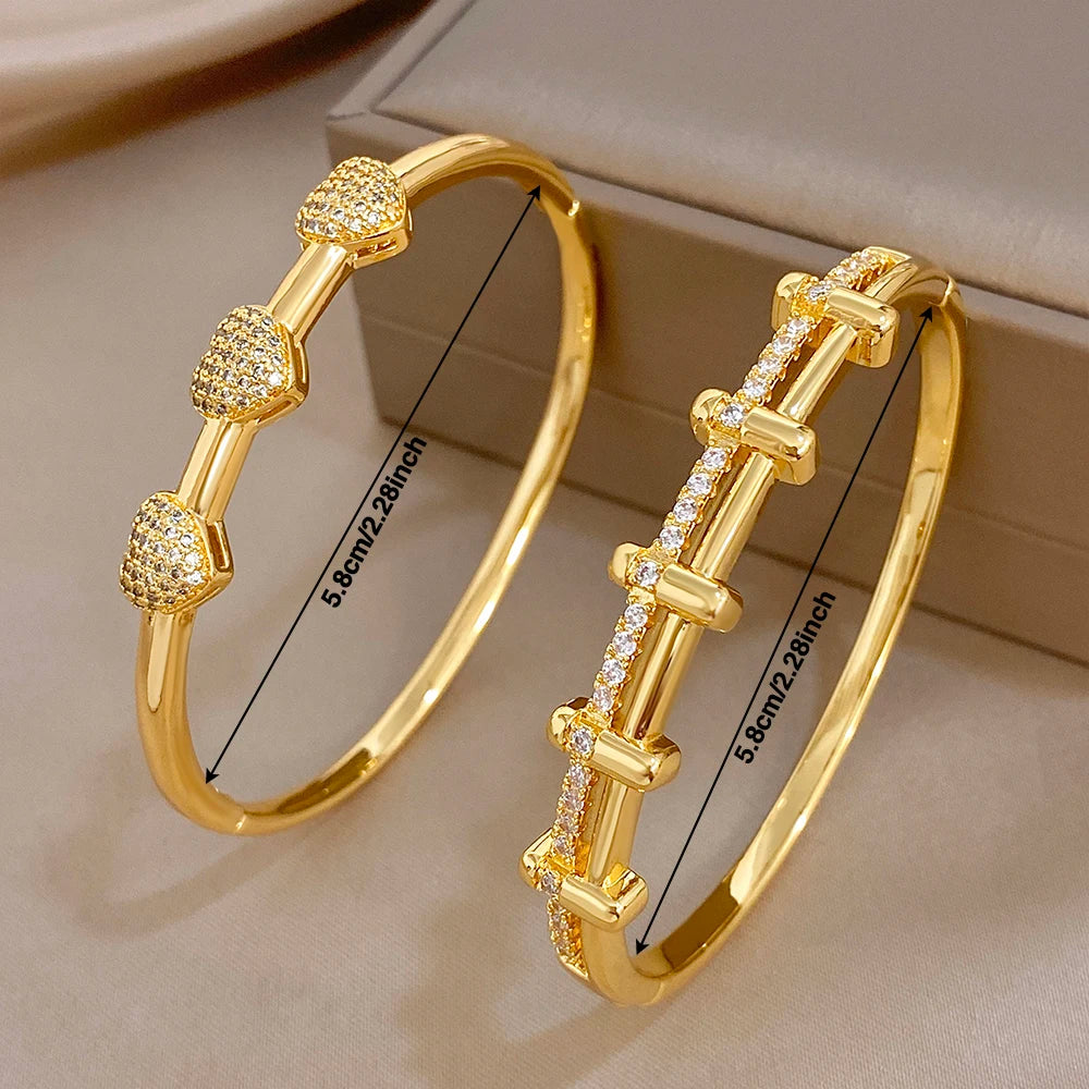 Gold-tone zircon cuff bangles with interlocking bar link design, pave set