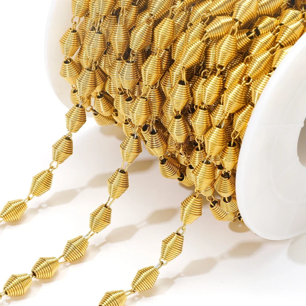 Gold spiral chain with flower-like swirl links for DIY jewelry making