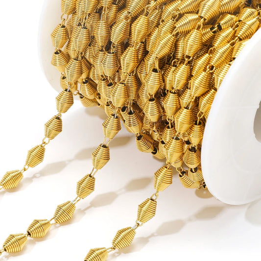 Gold spiral chain with flower-like swirl links for DIY jewelry making