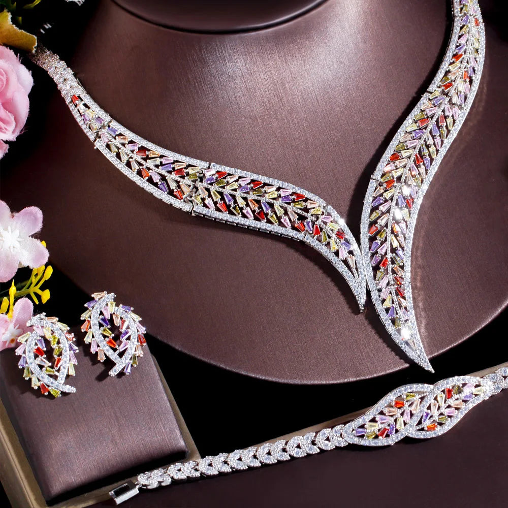 Detail view of multicolor CZ leaf necklace with matching earrings and bracelet