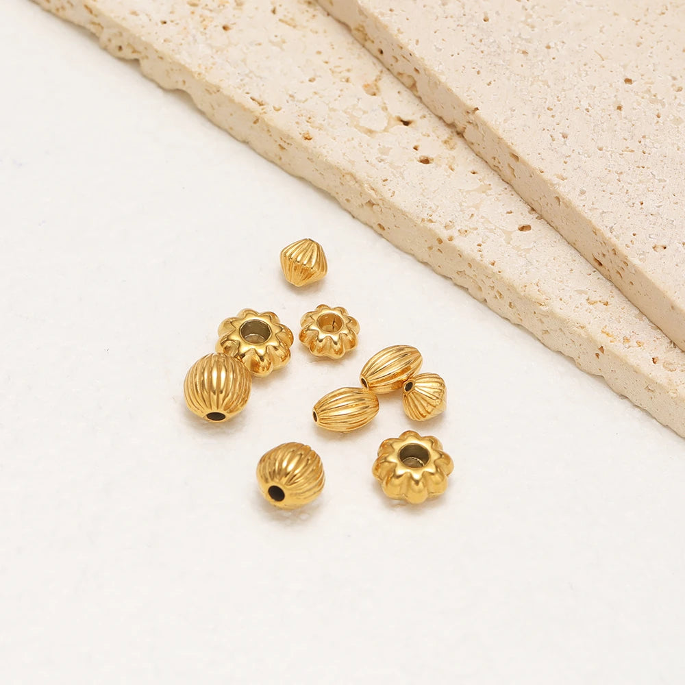 Gold-plated ribbed pumpkin spacer beads assortment, small round beads with hole