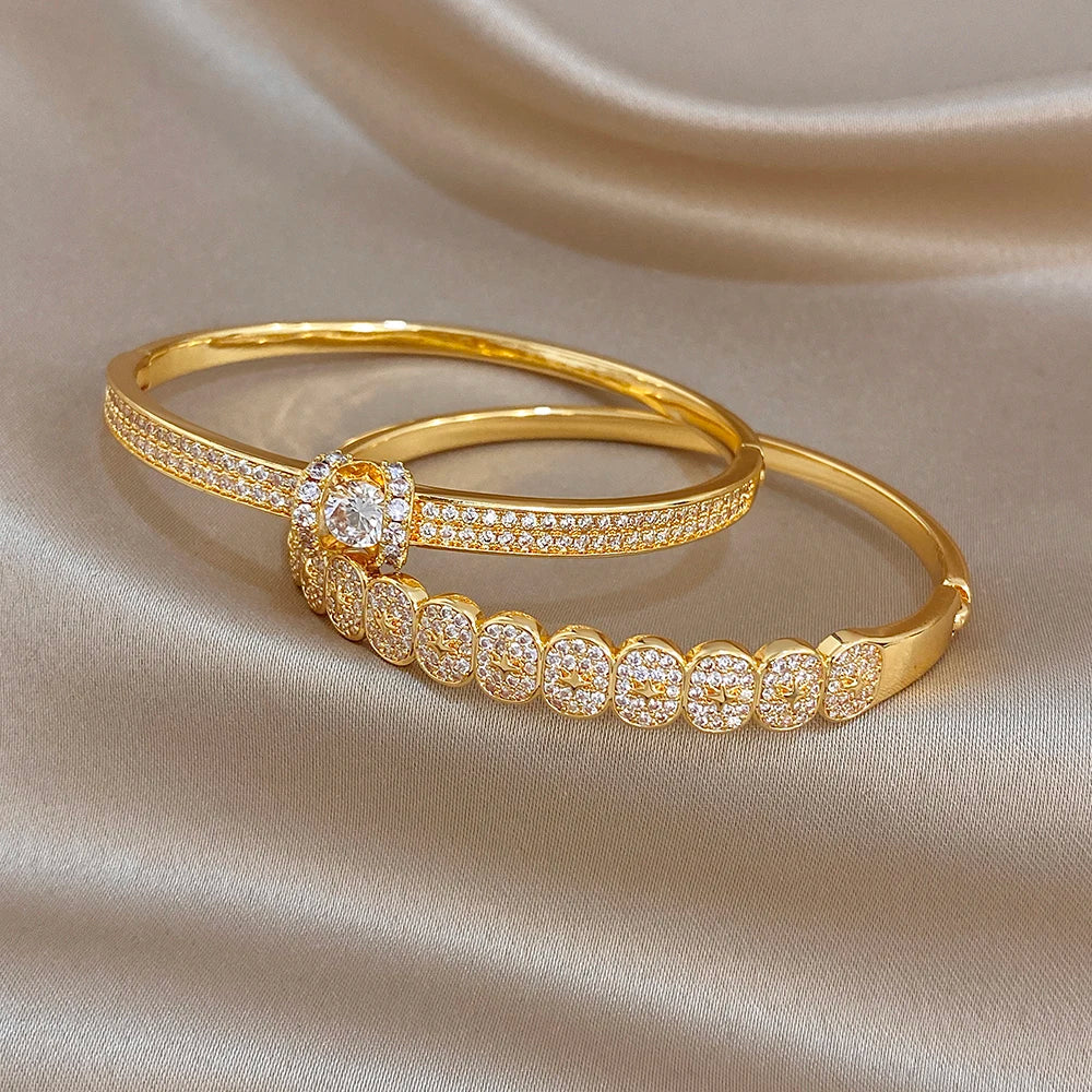 Gold-plated stacked cuff bracelet with rhinestone star and pavé-set accents