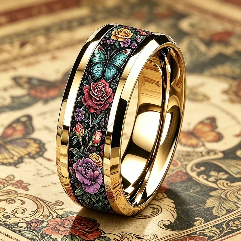 Floral butterfly stainless steel ring with black band and gold-tone inner edge