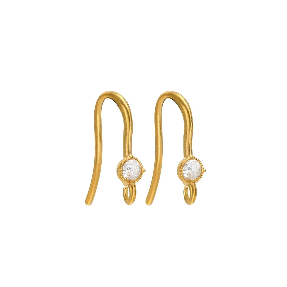 Gold-tone ear wire hooks with round clear zircon centerpiece