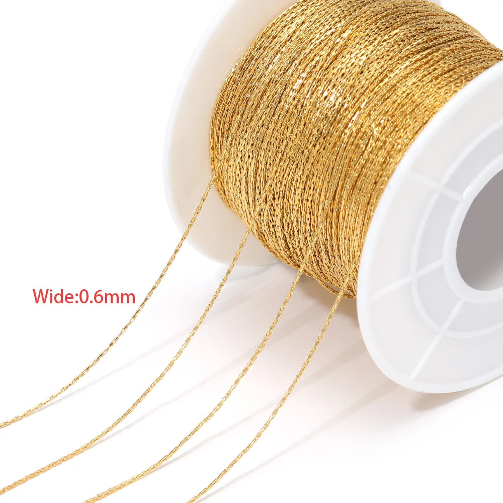 Gold thin wire chain 0.6mm on spool with loose strands for jewelry
