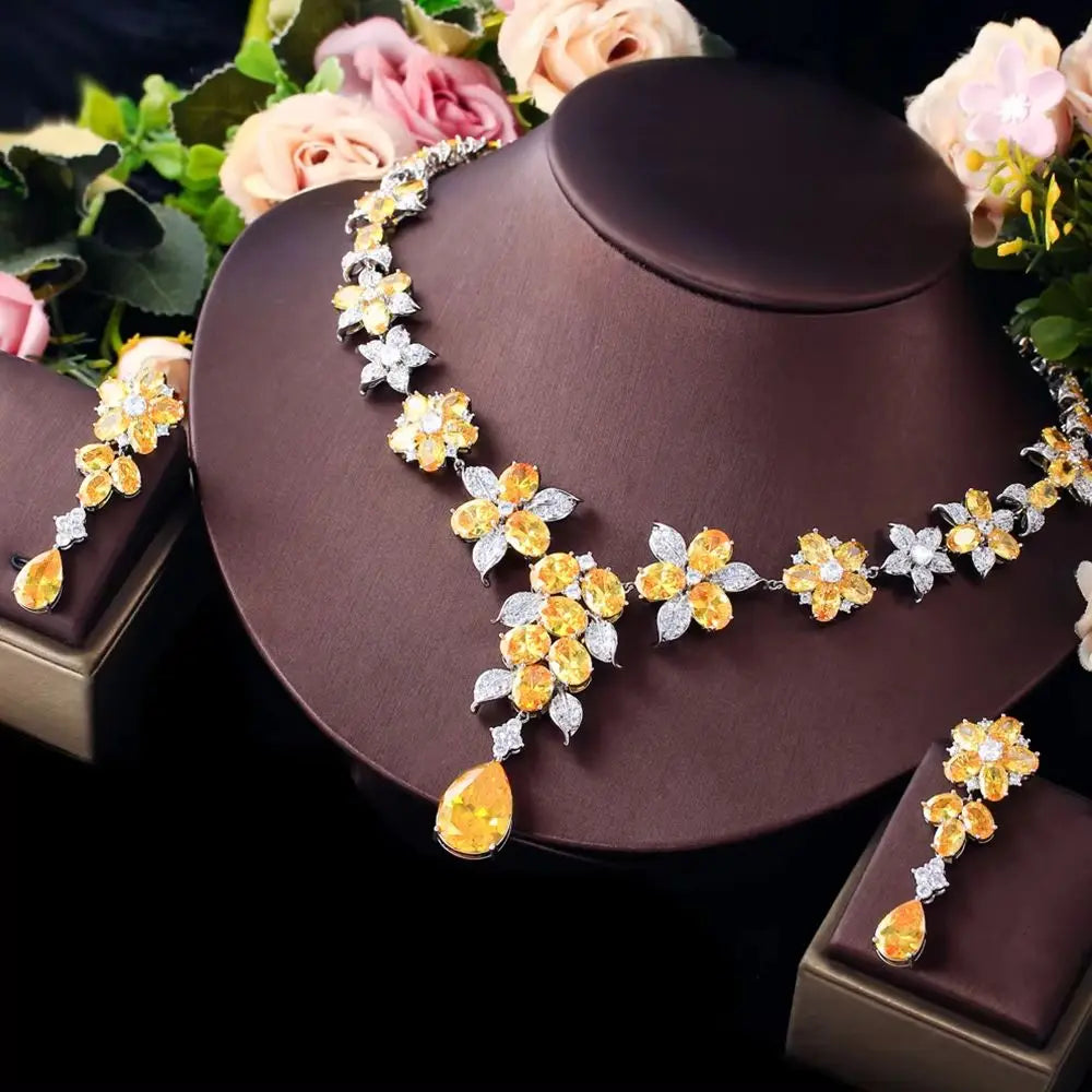 Flower zircon necklace centerpiece and matching earrings, shown at an angle