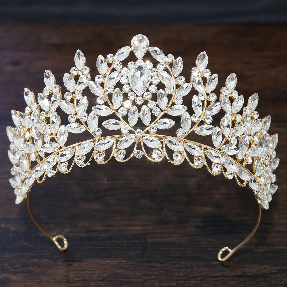 White crystal leaf-branch tiara with teardrop stones and gold-tone arched headband