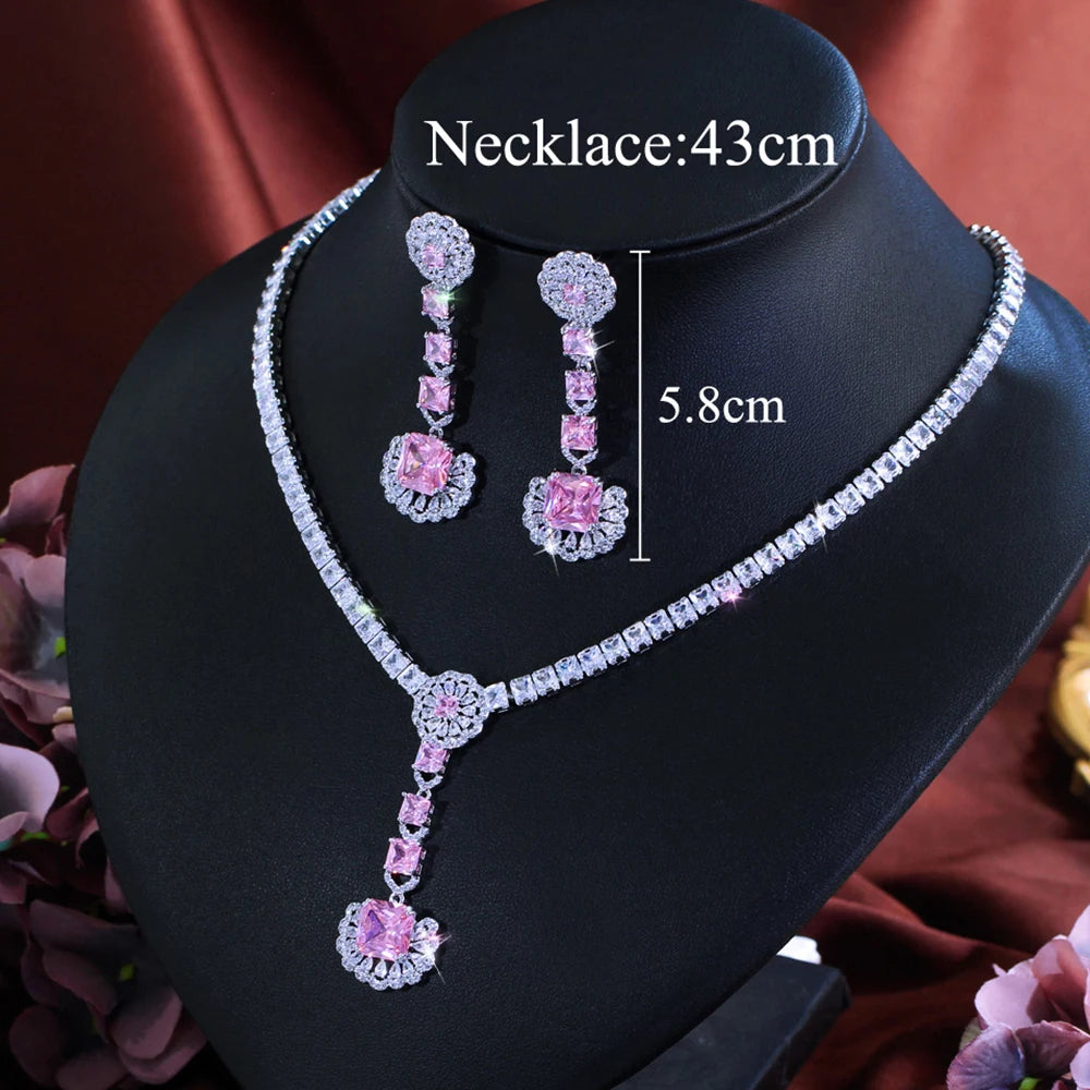 Silver-tone necklace and matching pink zirconia drop earrings with teardrop pendant