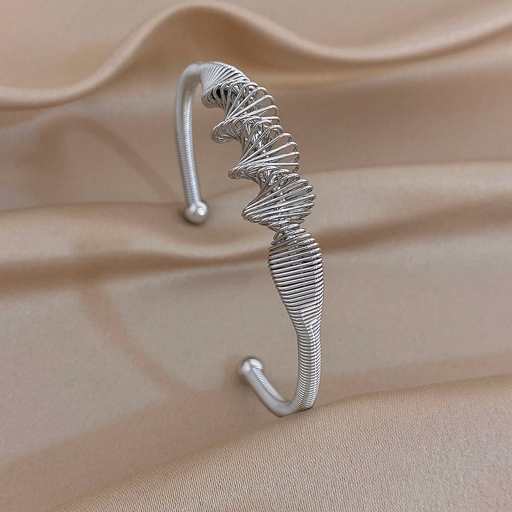Silver textured wave cuff bracelet with rounded end tips