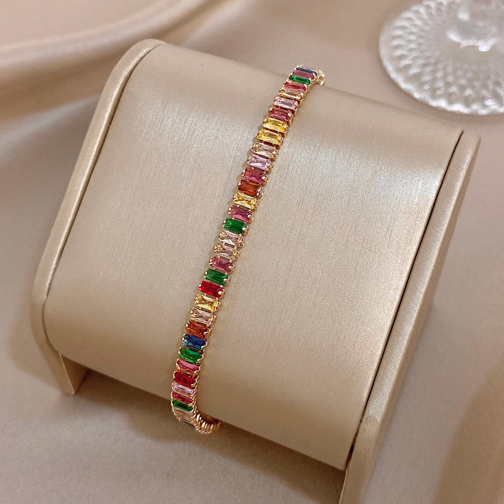 Gold-tone rainbow zircon bracelet with multicolor baguette stone row