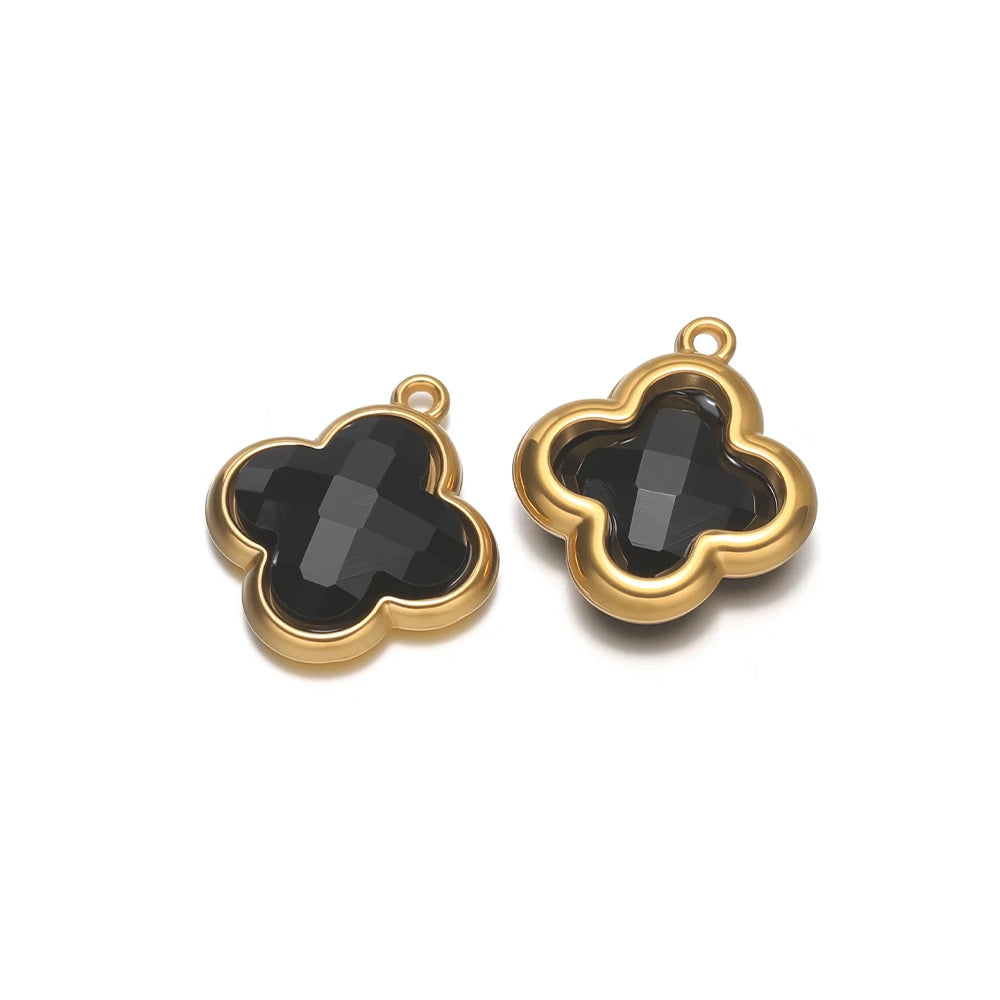 Four-leaf clover glass charm pendant with black gem and gold-tone loop