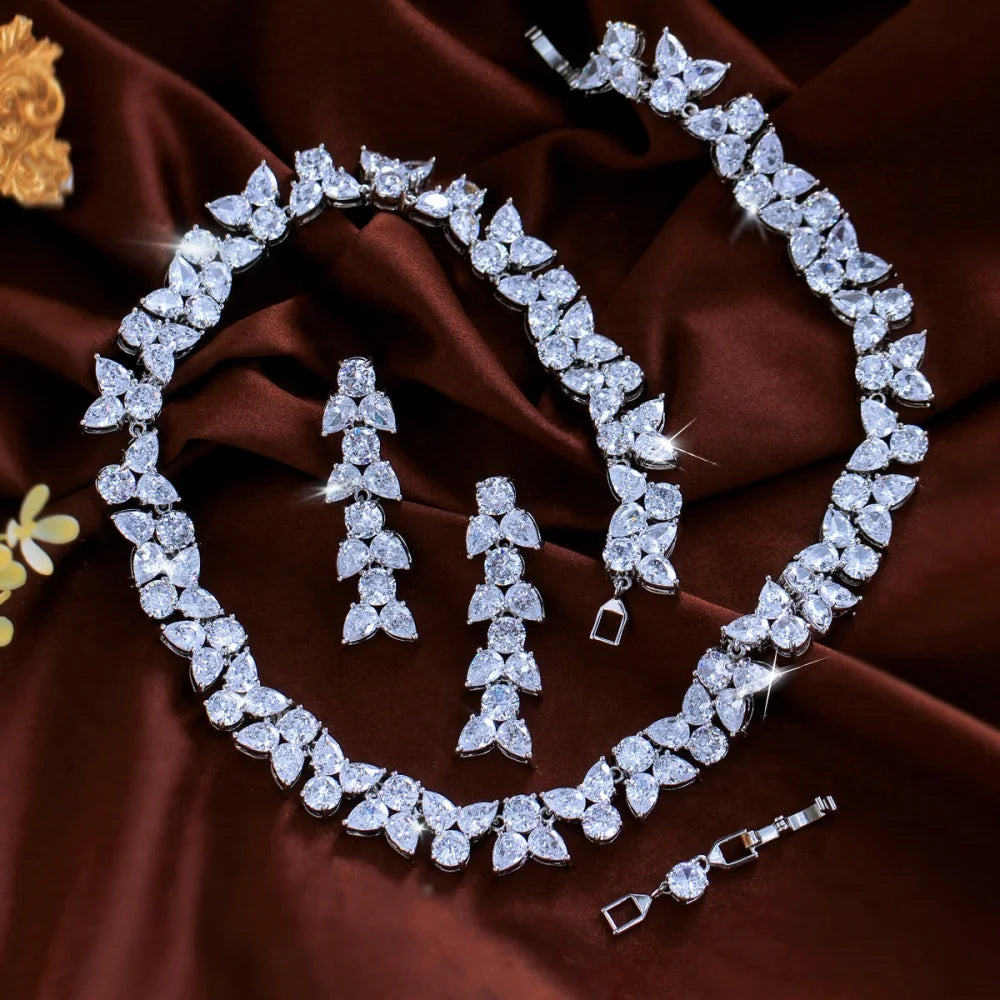Clear zirconia leaf necklace with matching dangling earrings and clasp details