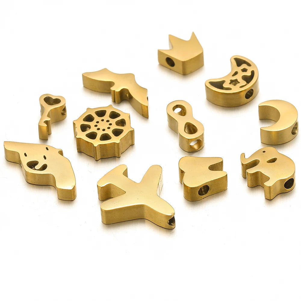 Gold-tone stainless steel spacer beads set, assorted animal and symbol shapes
