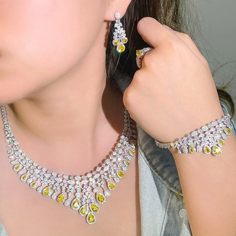 Bridal necklace and earrings set with oval and marquise crystal drops, yellow accents