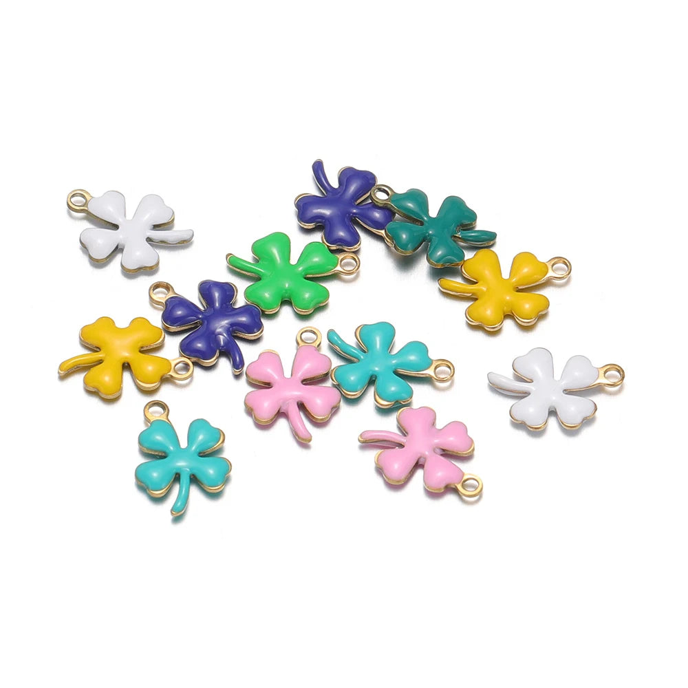 Assorted enamel clover flower charms with gold-tone loops, multicolor set