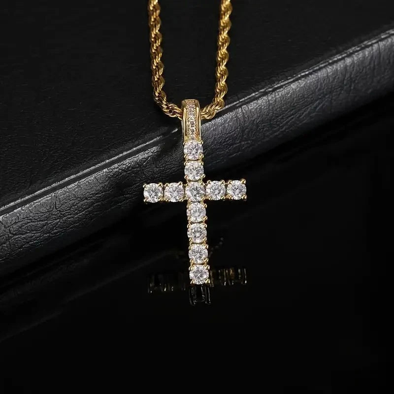 Gold-tone cubic zirconia cross pendant on a chain necklace