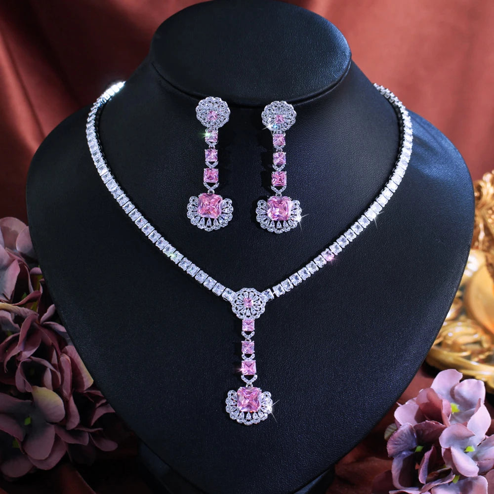 Silver-tone necklace with pink zirconia pendant and matching drop earrings set