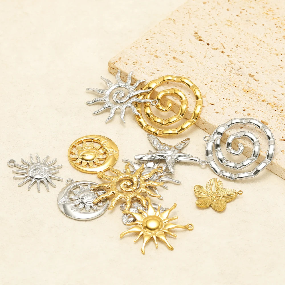 Mixed sun and starfish charms in gold and silver-tone stainless steel, assorted shapes
