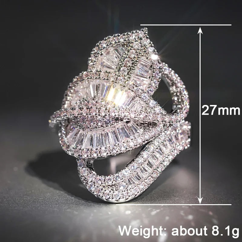 Irregular crystal leaf ring with clear stones; 27mm length, about 8.1g weight