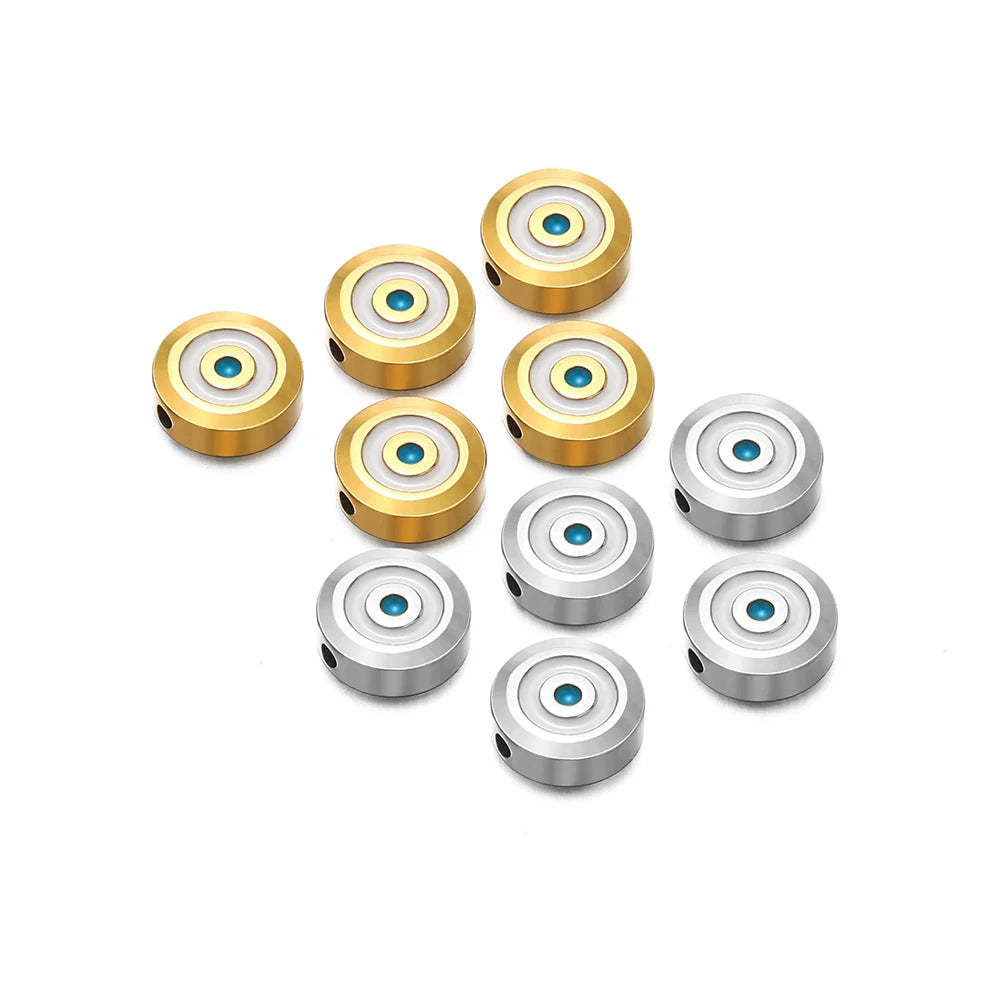 Collection of round evil-eye enamel beads in gold and silver tones with blue centers
