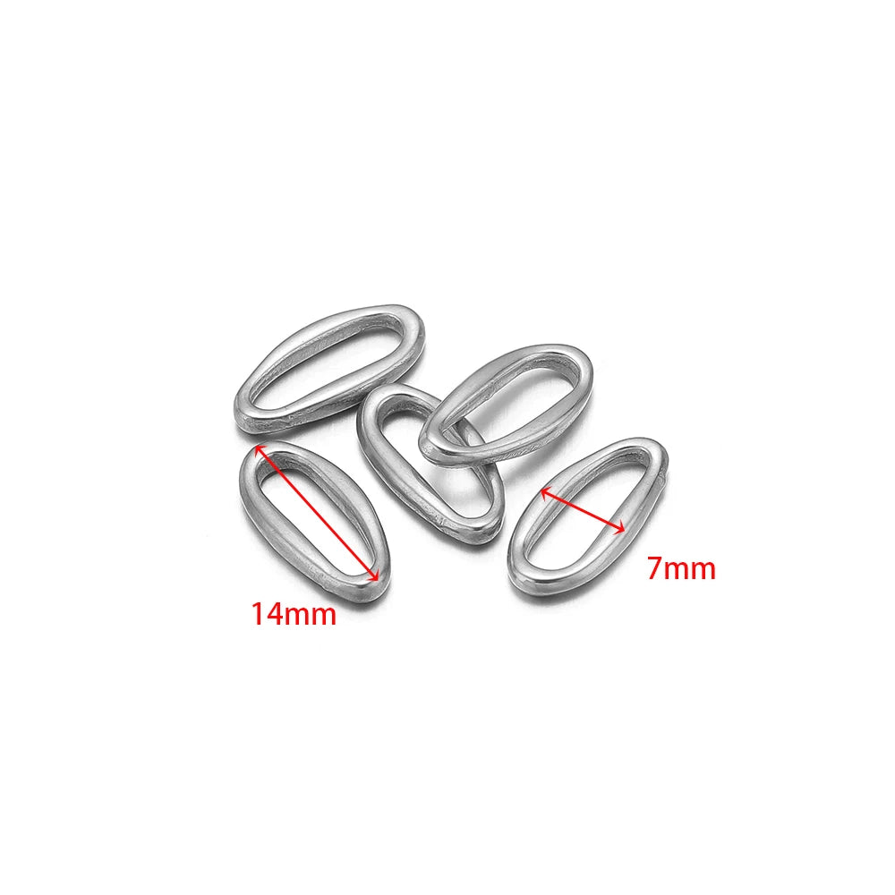 Silver irregular oval charm links with size marks 14mm and 7mm