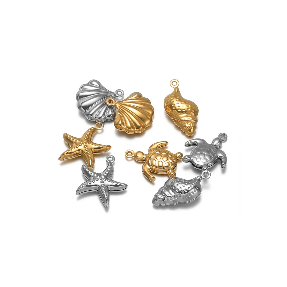 Sea animal charms with loops: starfish, shells, turtle, and conch in mixed gold and silver