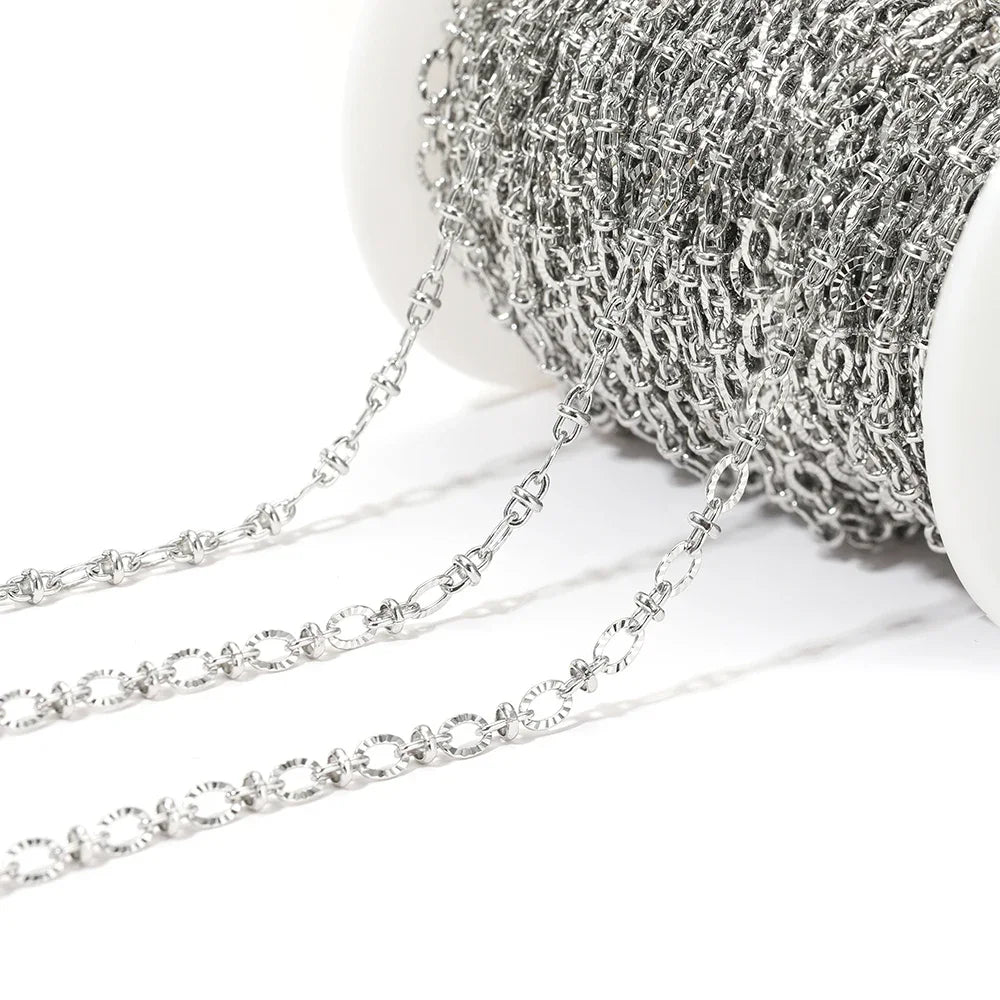 Silver embossed oval link chain, thin interlocking links for DIY jewelry projects