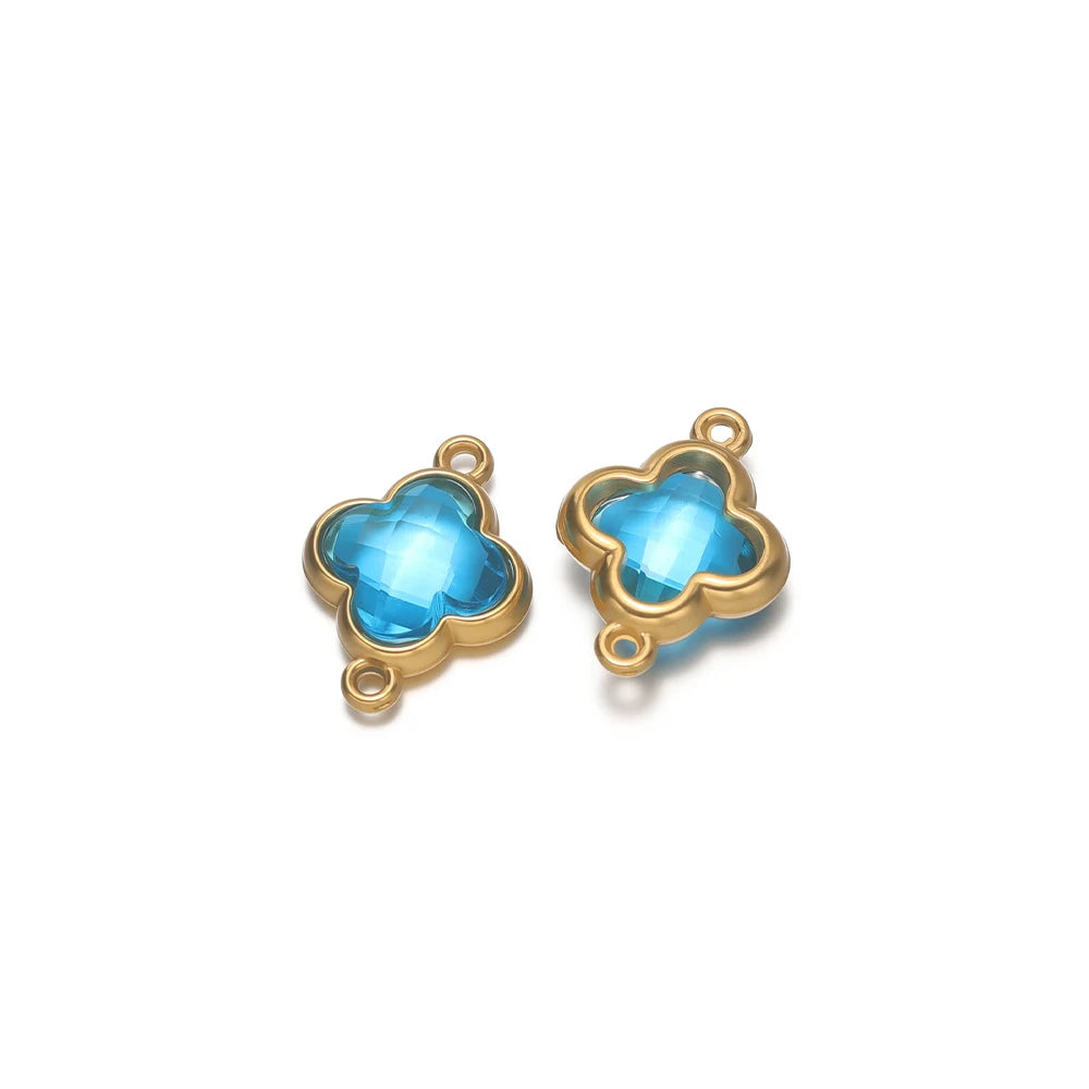 Four-leaf clover glass charm pendant in bright blue with gold-tone loops, for DIY jewelry