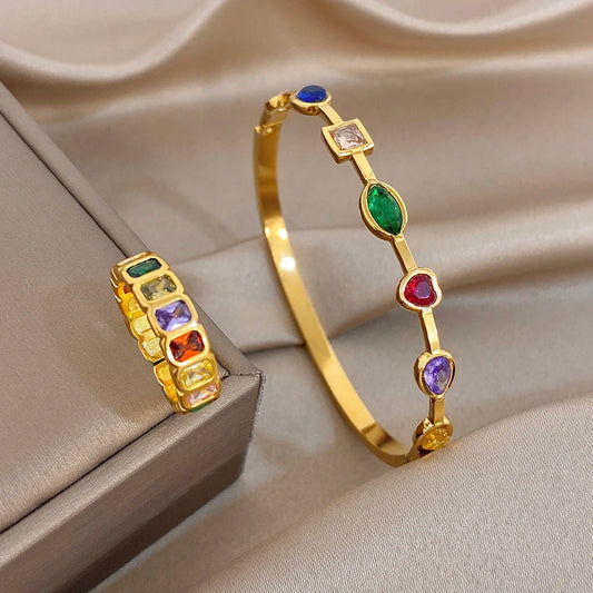 Gold-tone geometric bangle bracelet with multicolor square and oval stones