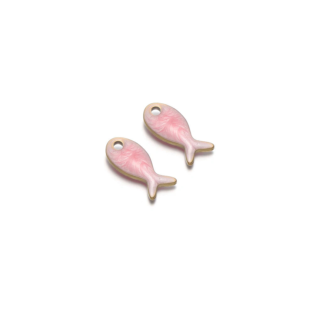 Pair of pink double-sided fish charms with round hanging holes