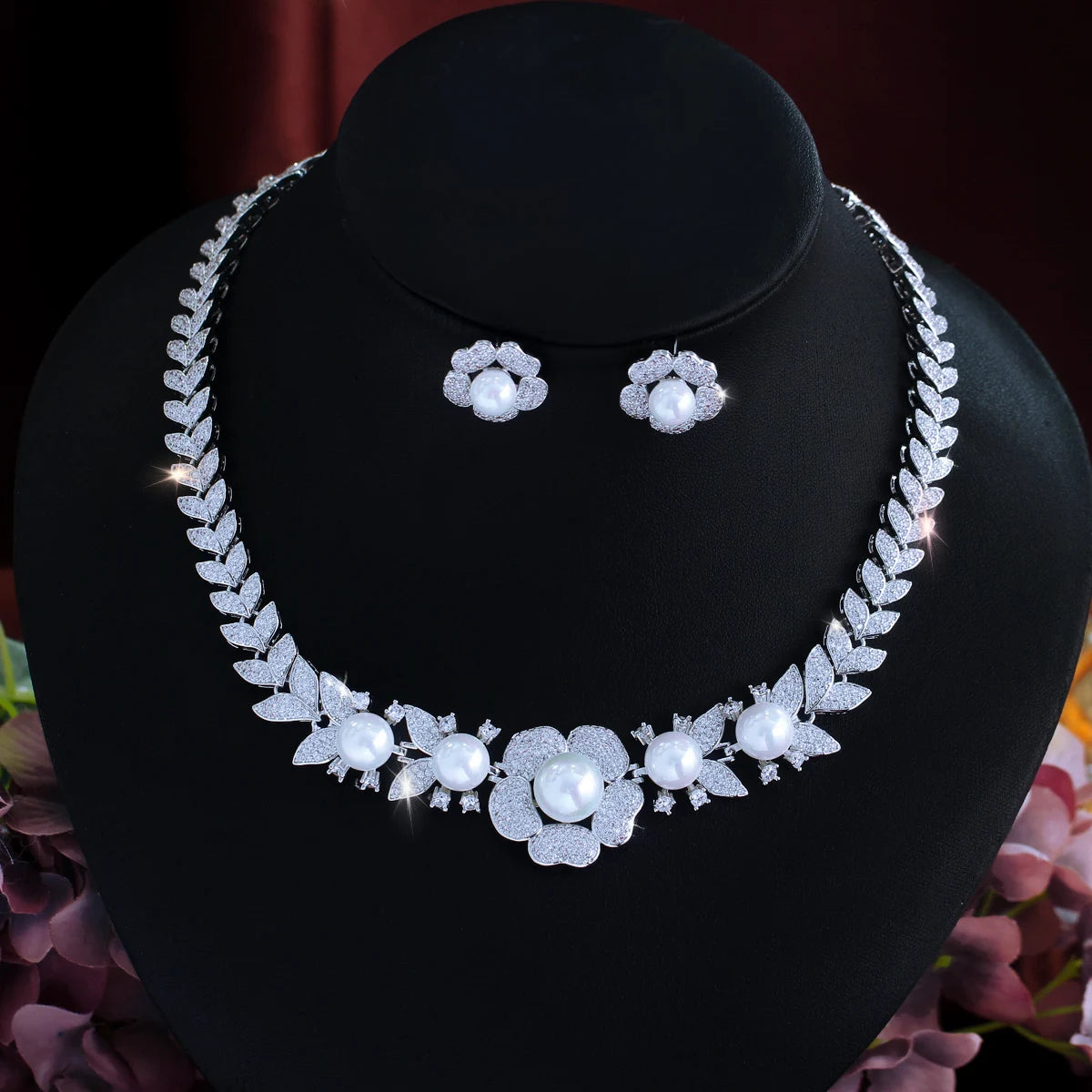 Silver-tone necklace and flower stud earrings with cubic zirconia and pearl accents