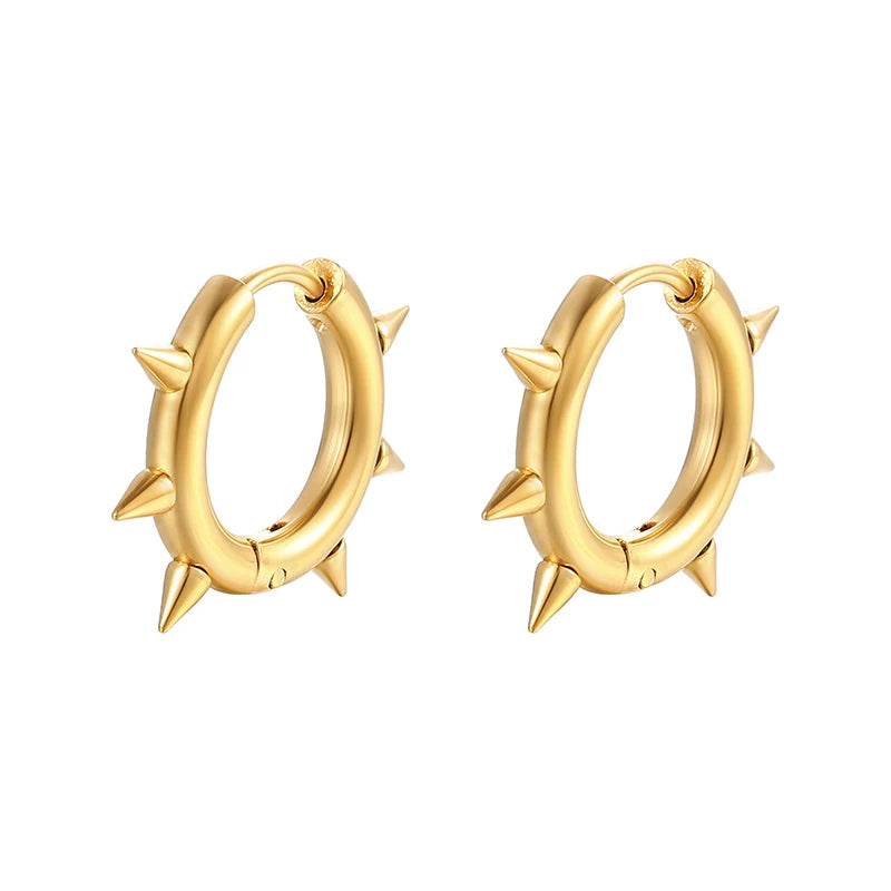 Gold oval hoop earrings with small pointed studs around the outer edge