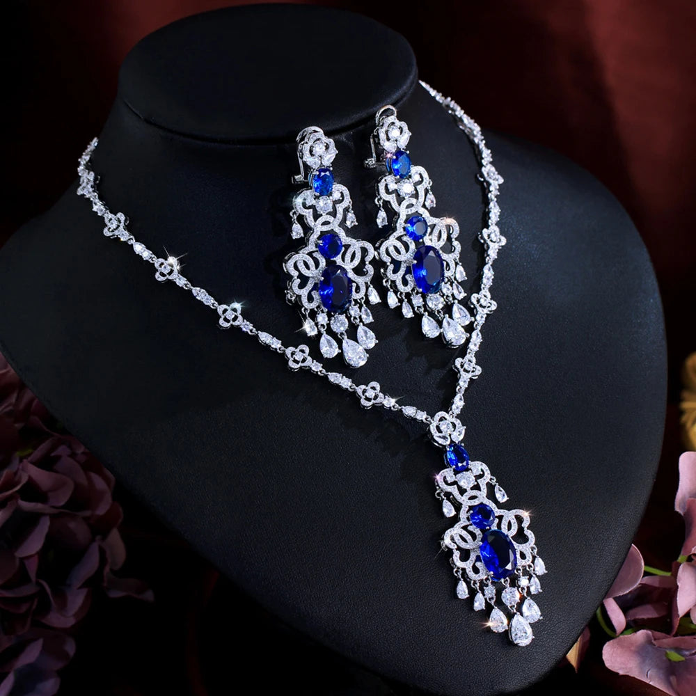 Royal blue crystal necklace and chandelier earrings in silver-tone metal setting